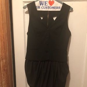 Boutique Black dress with draping, gold zipper